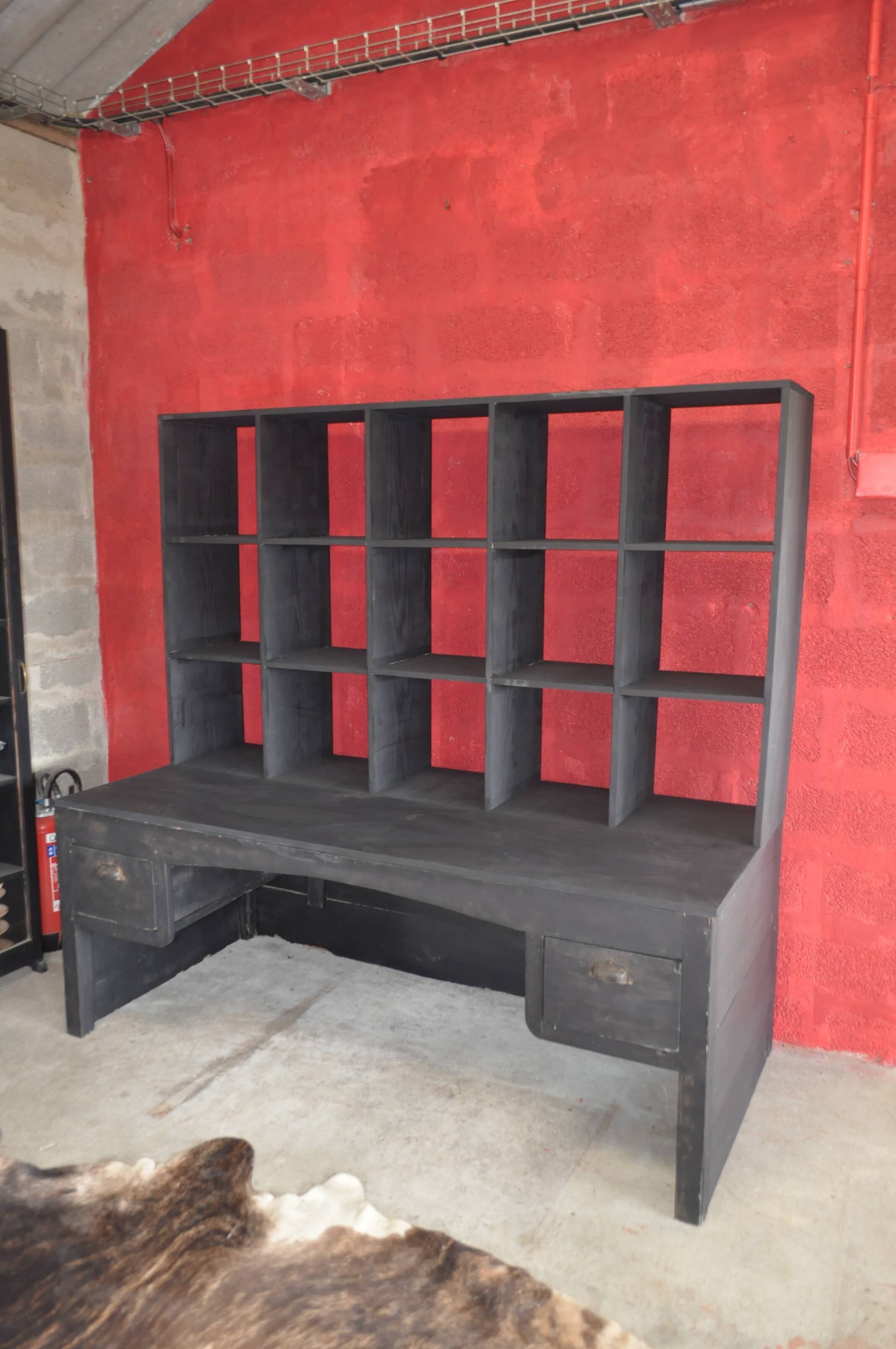 Wooden postal sorting desk.