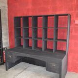 Wooden postal sorting desk.