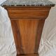 Elegant antique Napoleon III side table in walnut with black marble veneer.