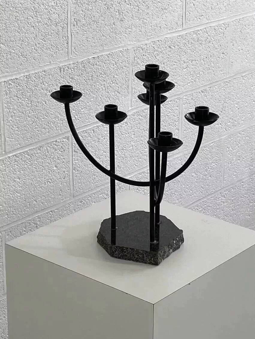 Metal candle holder and black quartz base