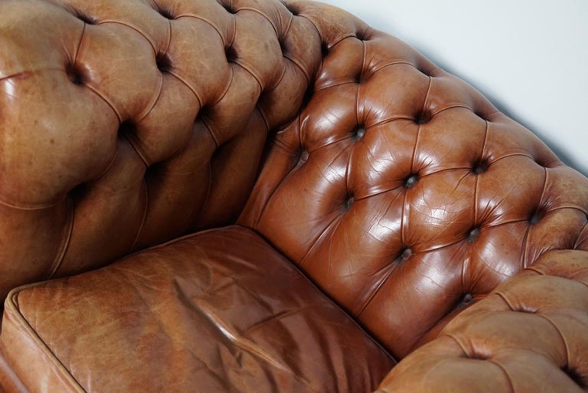 Set of 2 vintage chesterfield club armchairs in cognac leather, Netherlands,