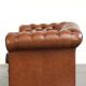 Very spacious 2-seater Chesterfield sofa in cow leather in a English look