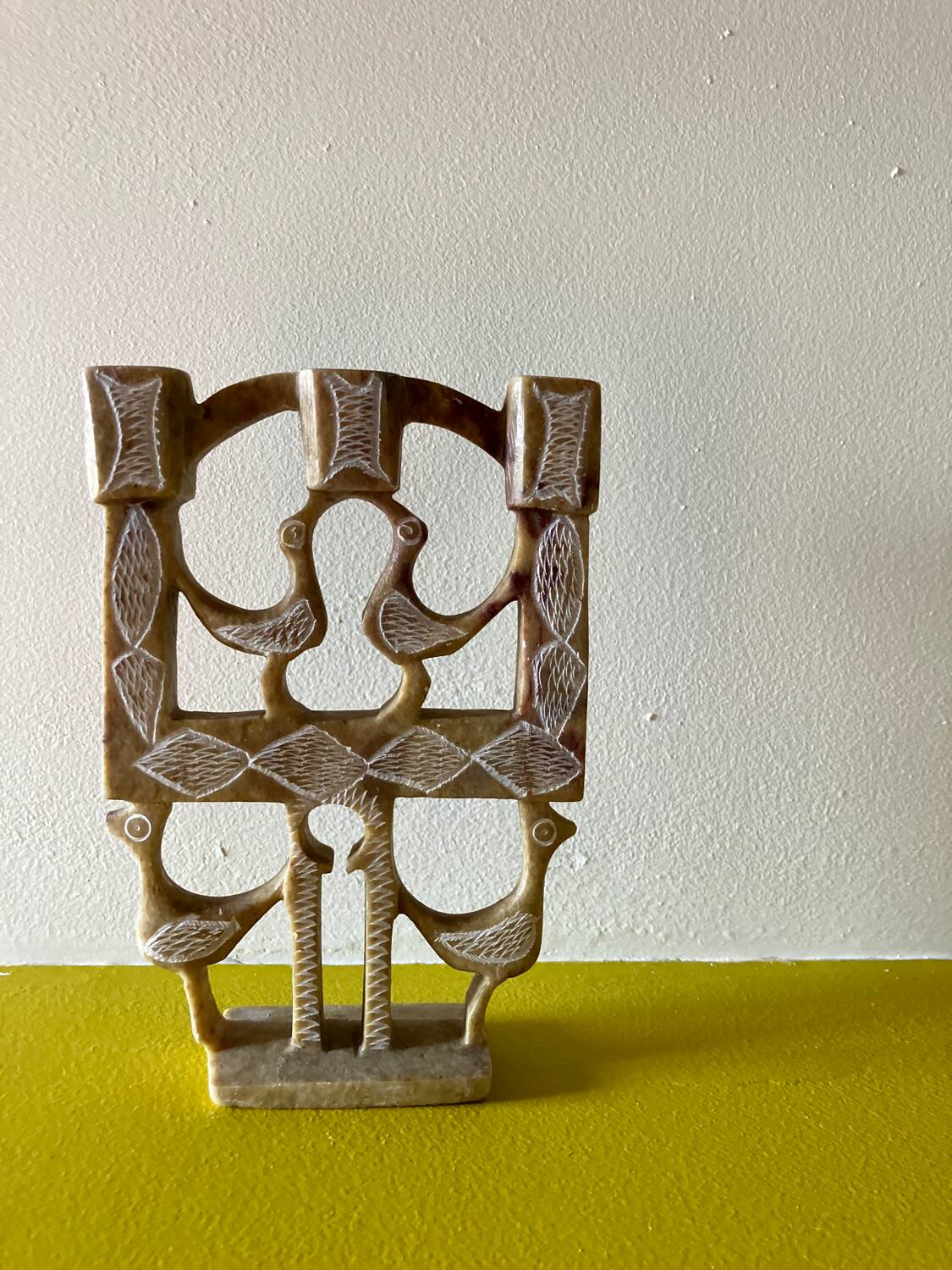 Vintage stone folk art candle holder