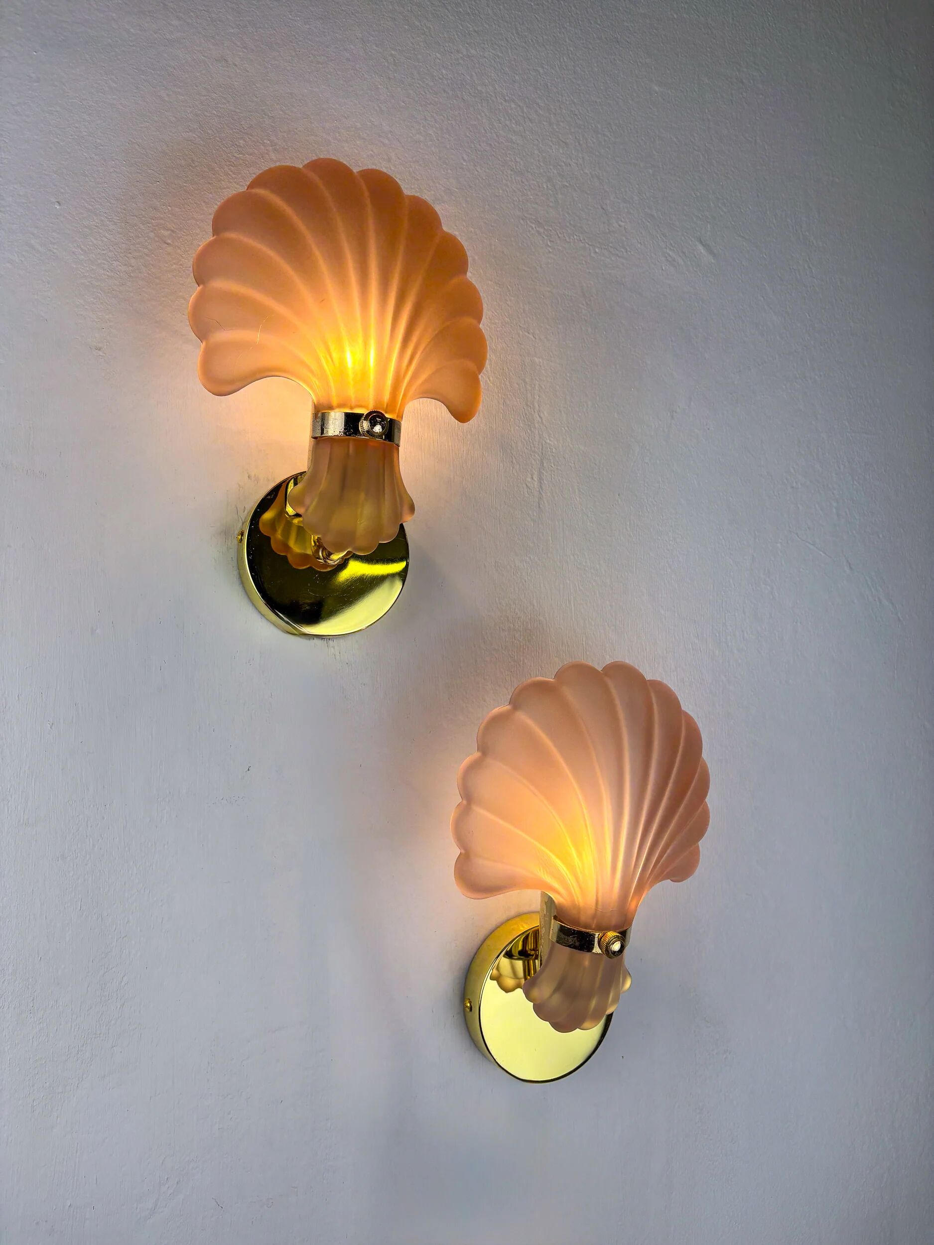 Pair of Art Deco shell wall sconces – amber glass, France 1970s