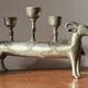 Pair of religious silver-plated zoomorphic candlesticks