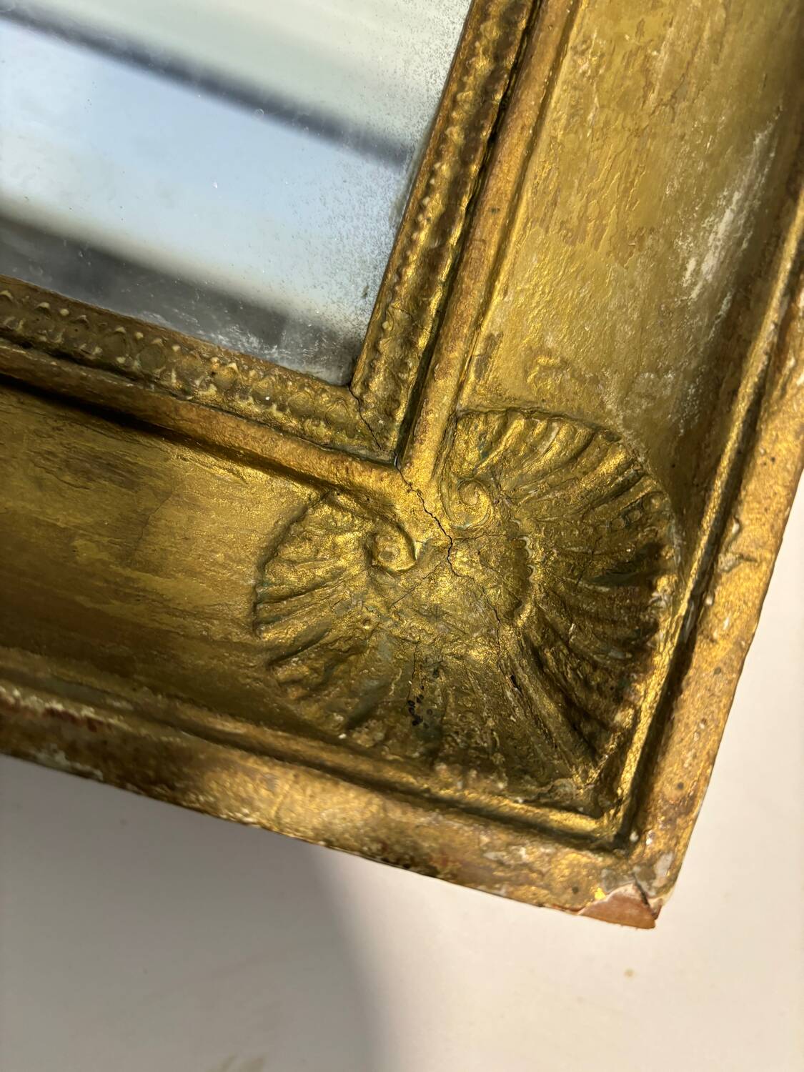 Mercury mirror and old wooden frame