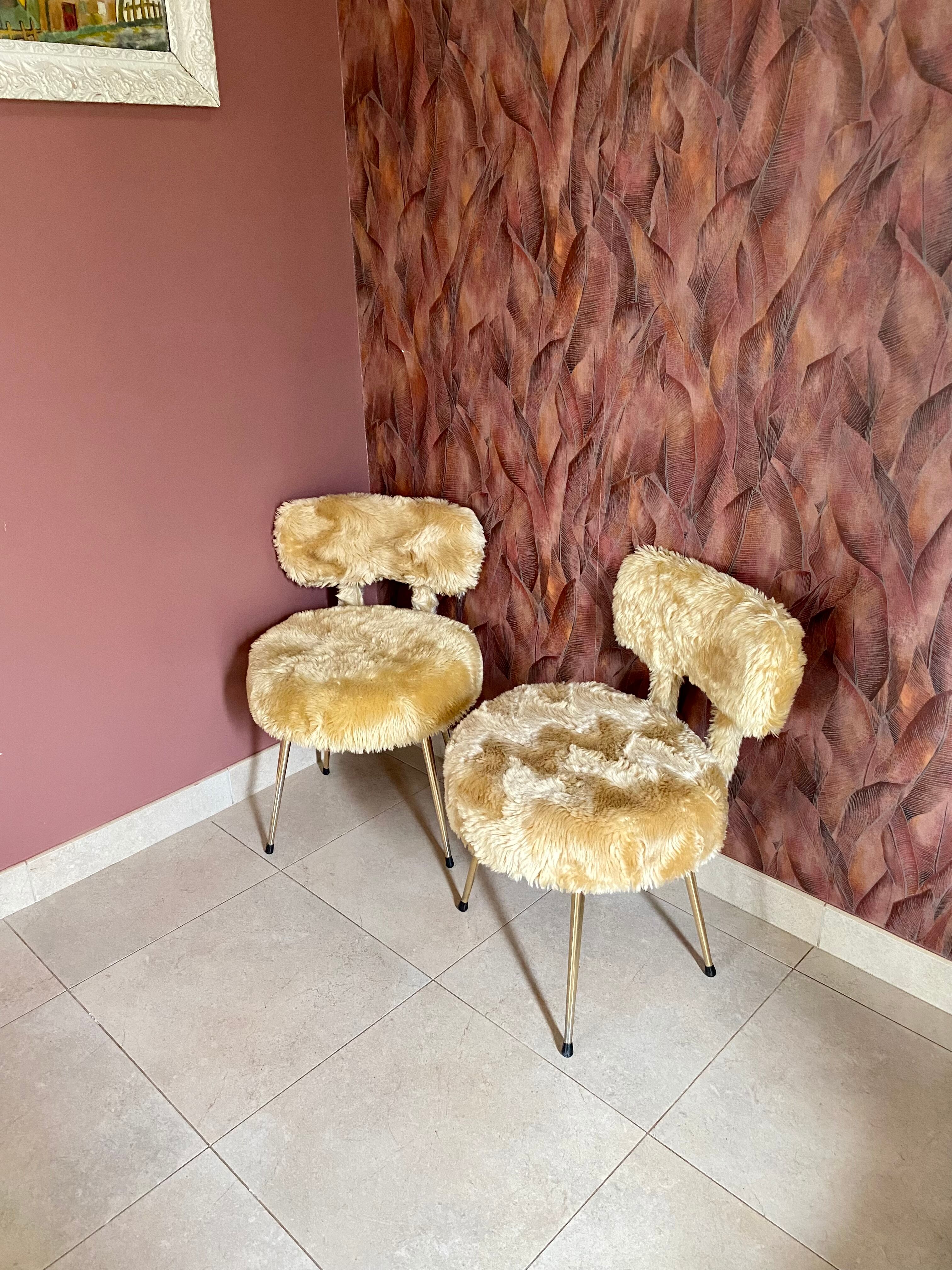 2 Pelfran chairs, moumoute chairs, golden compass legs, vintage from the 60s.