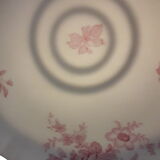 Porcelain dish decorated with handles