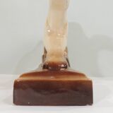 Beige and brown ceramic representing a “Greyhound/vintage 1930