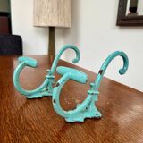 Pair of painted metal wall hooks