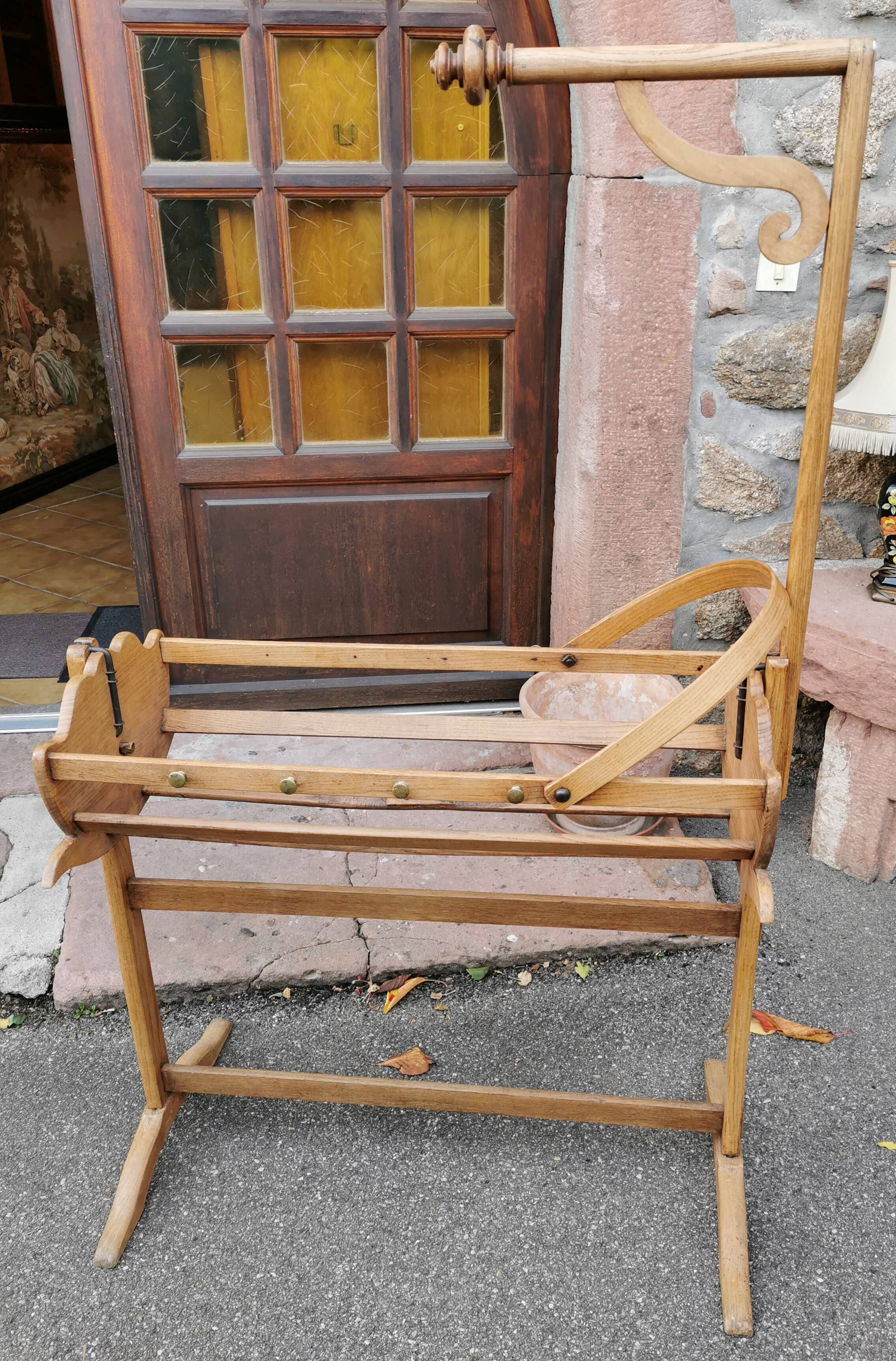Old cradle with solid oak canopy