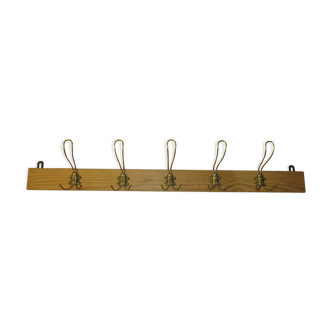 old coat rack with 5 metal hooks