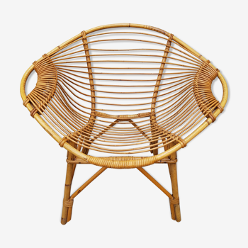 Old adult lemon style rattan armchair