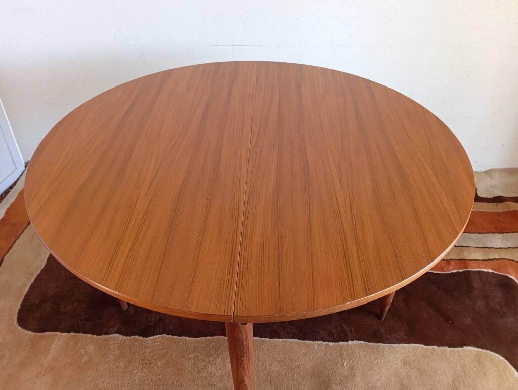 Scandinavian round extendable teak table