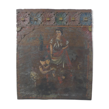 Painting on carved wood panel