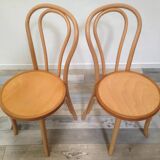 Pair of curved wooden bistro chairs