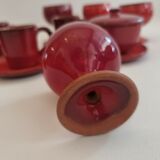 Red enamelled terracotta: cups, saucers, glasses