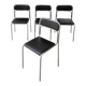 Bauhaus-style tubular steel chairs with black faux leather upholstery, Italian modernist dining room