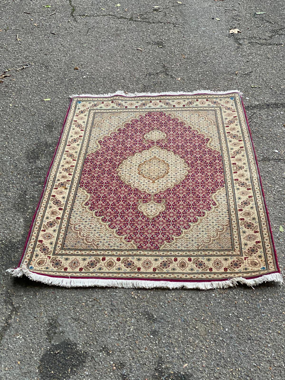 Handmade burgundy wool Persian rug 100x155cm