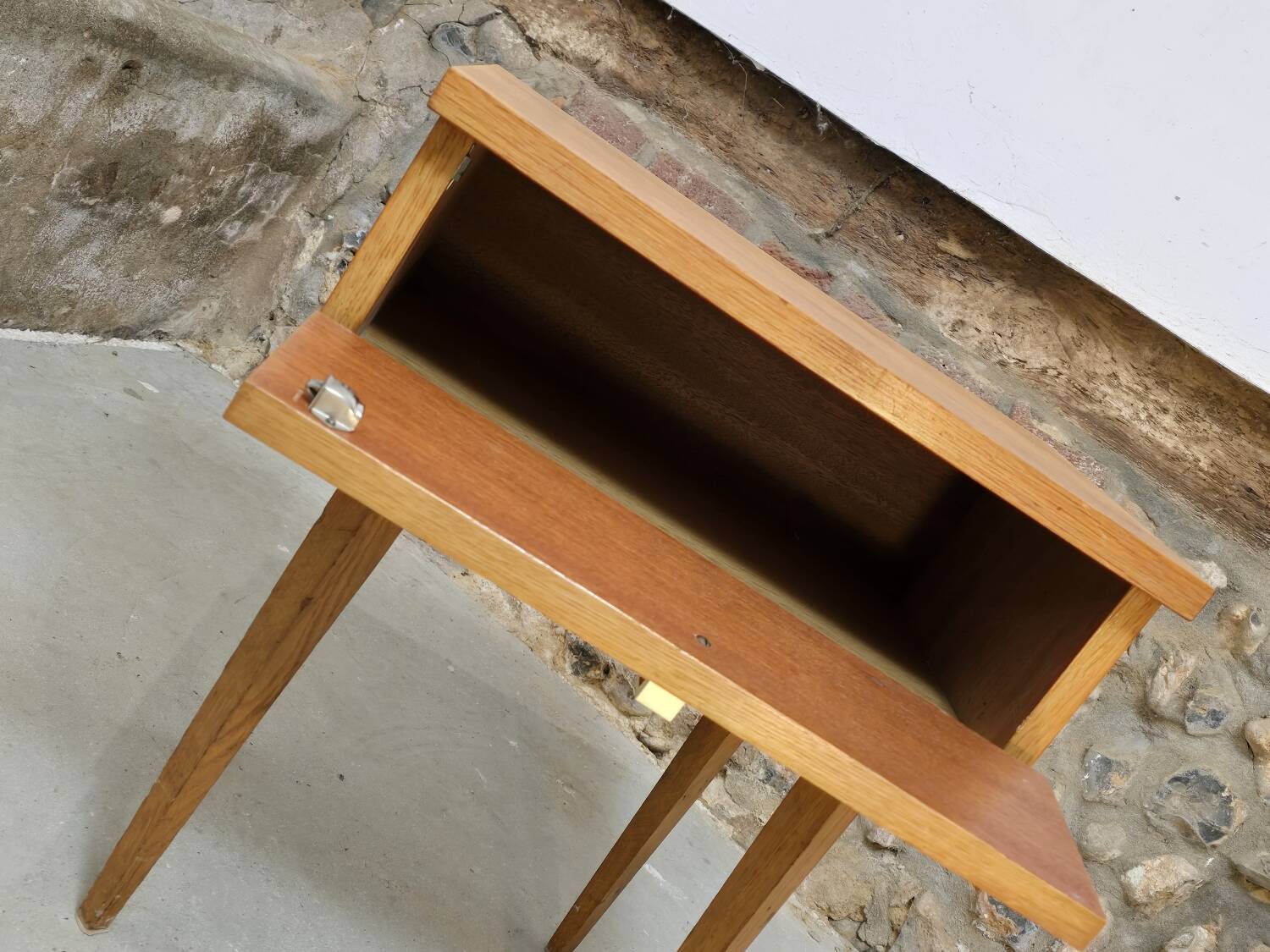 Scandinavian bedside table with hinged drawer