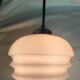 Suspension in opaline