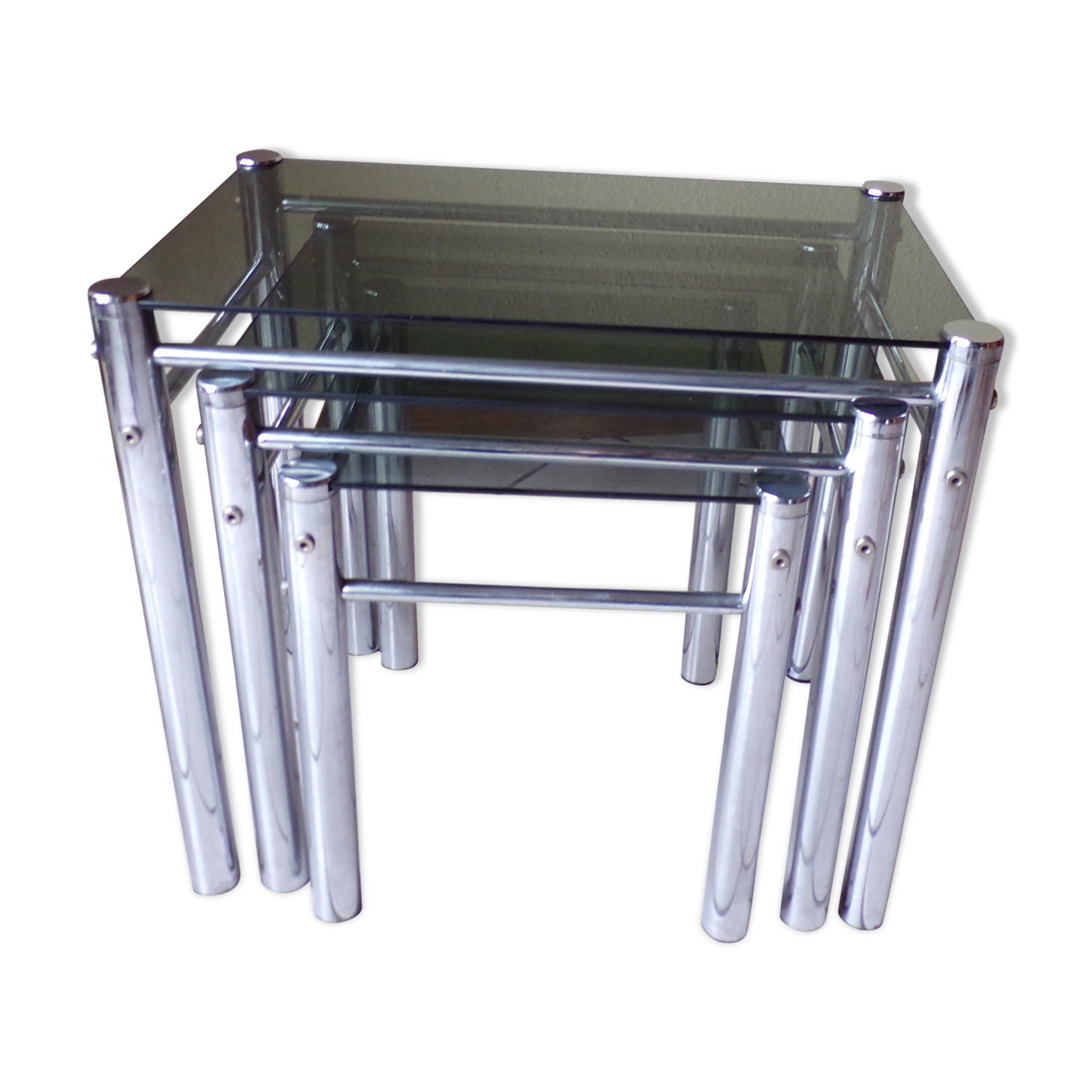 Pull-out tables in glass and metal 80 years