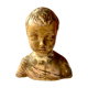 Carved earth bust