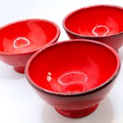 Set of 3 bright red enamelled earth bowls made in France
