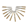 Ensemble de 12 couteaux en bakélite effet corde beige années 60