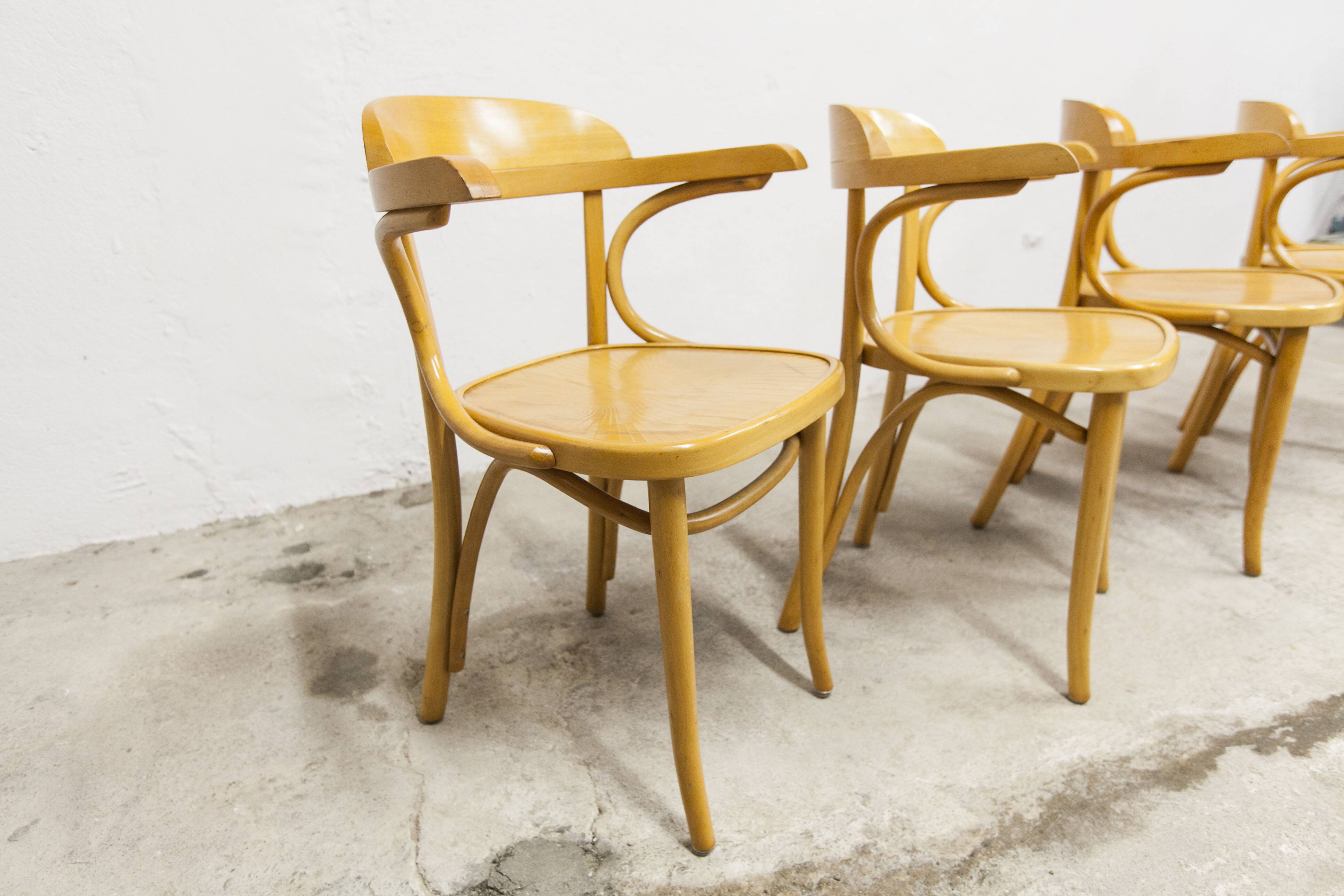 Set of 4 bistro armchairs with armrests from the 1960s.