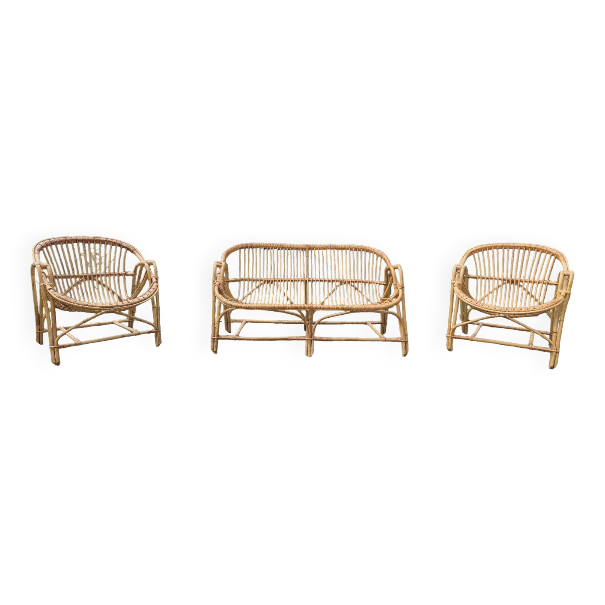 Rattan lounge with two armchairs and a vintage 1950s bench.
