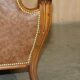 Chesterfield Regency 1810 antique canapé restored in leather with a carved frame.