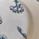 Two ironstone plates from Lunéville Keller and Guérin with a floral pattern.