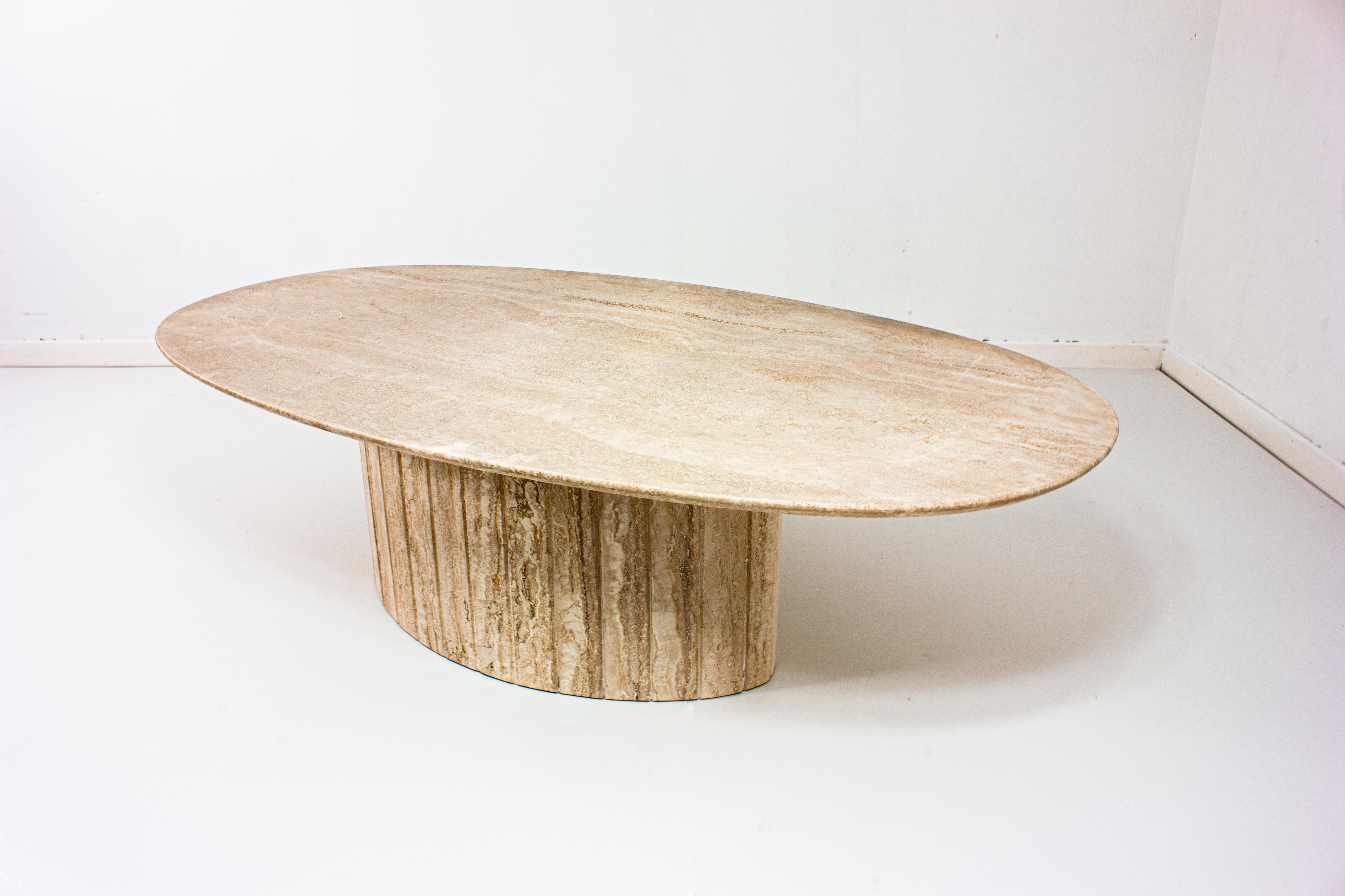 Oval Italian coffee table in travertin, 1970s