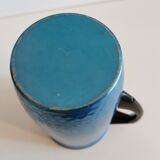 Vintage hammered blue metal pitcher
