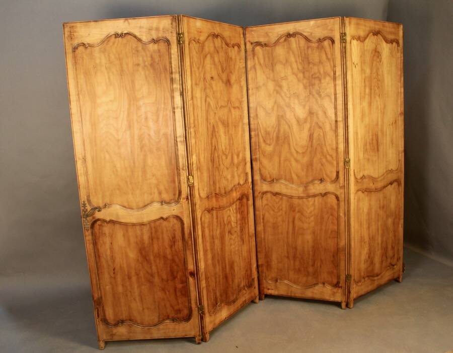 Large cherry wood folding screen with four double-sided panels.