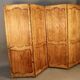 Large cherry wood folding screen with four double-sided panels.