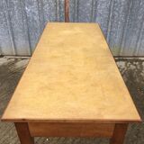 Antique solid cherry farmhouse table with 2 front drawers.