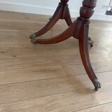 Antique table with wrought iron leg