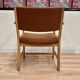 SUITE DE 4 FAUTEUILS ESTAMPILLE "HANS WEGNER" 1960.