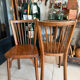 Pair of vintage Baumann bistro chairs in wood.