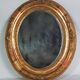 Antique oval mirror with original stucco and gilt wood frame, 37x31 cm. Beautiful patina.