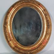 Antique oval mirror with original stucco and gilt wood frame, 37x31 cm. Beautiful patina.