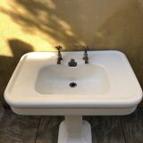 Antique washbasin on ceramic column