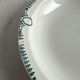 Shallow dish St Amand decorated with green crowns.