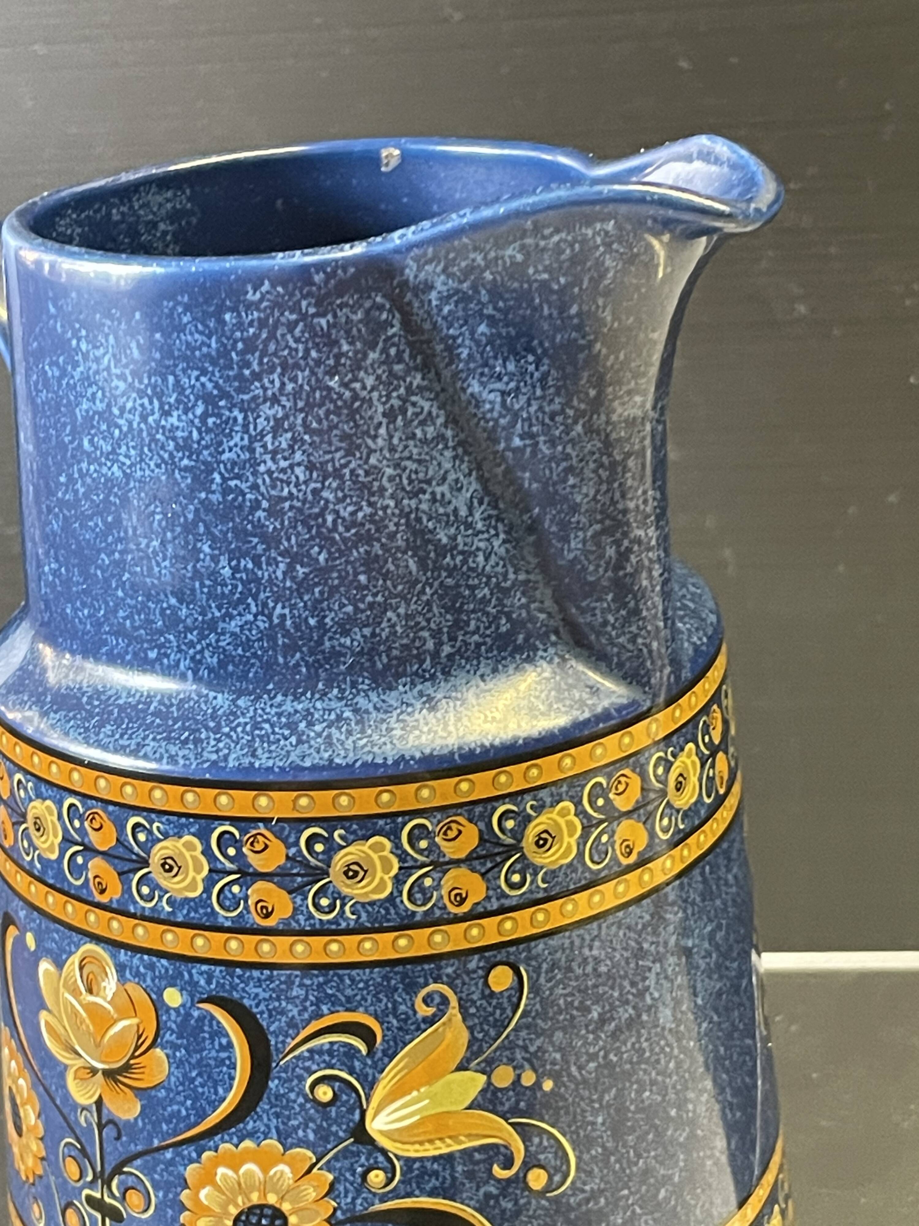 Very nice blue ceramic jug in good condition.