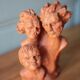 Sculpture signed Doloire, terracotta sculpture with 3 faces, candlestick sculpture, collection, interior decoration.