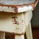 Workshop stool in antique patinated solid wood