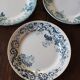 A set of 4 flat plates Terre de fer mismatched blue