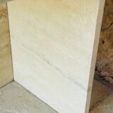 Vintage side table in travertine, circa 1980s.